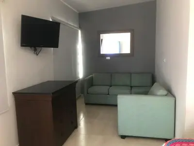 Una televisión o centro de entretenimiento en Casa Paraiso de Kino
