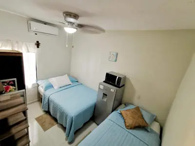 Cama o camas de una habitación en Posada Bugambilia