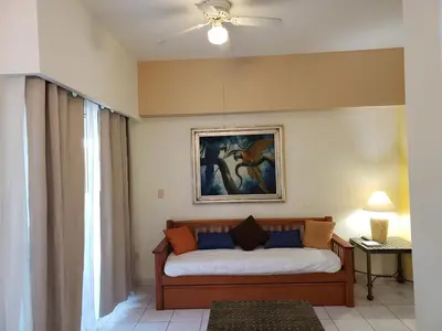 Cama o camas de una habitación en Condo Costa Bonita Beach & Resort