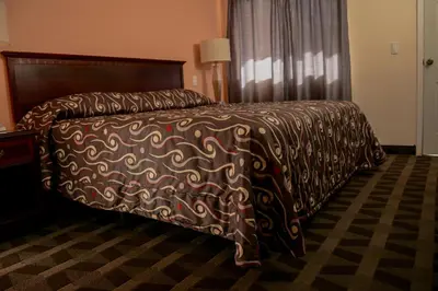 Cama o camas de una habitación en DURAZNO INN