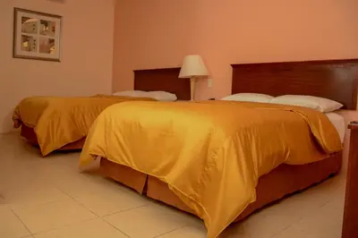 Cama o camas de una habitación en DURAZNO INN