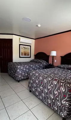 Cama o camas de una habitación en DURAZNO INN