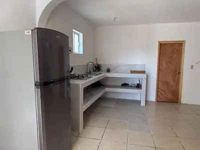 Una cocina o zona de cocina en Cabañas el Pino 0