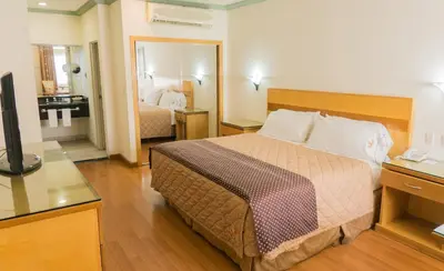 Cama o camas de una habitación en Hotel Santiago Plaza
