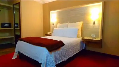 Cama o camas de una habitación en Hotel Royal Inn