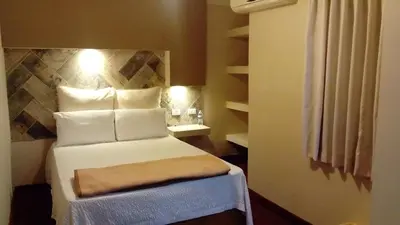 Cama o camas de una habitación en Hotel Royal Inn