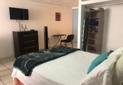 Cama o camas de una habitación en My Suite Ejecutiva