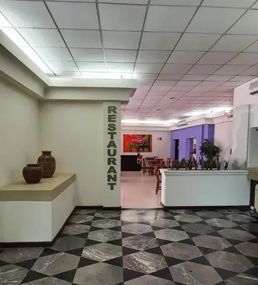 El vestíbulo o zona de recepción de Hotel el Mayo Inn