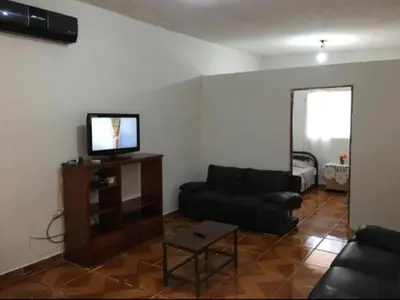 Una televisión o centro de entretenimiento en Casa 4-100-egas