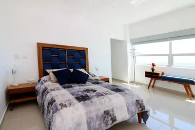 Cama o camas de una habitación en Torre eMe 1125 Mazatlán