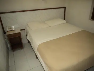 Cama o camas de una habitación en Hotel Kuraica
