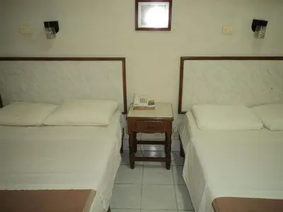 Cama o camas de una habitación en Hotel Kuraica