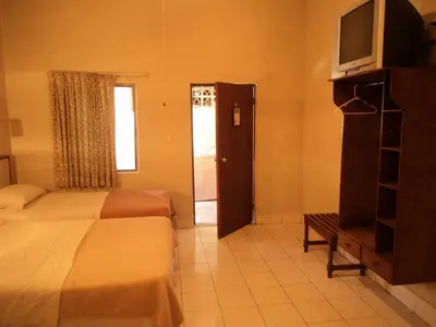 Una televisión o centro de entretenimiento en Hotel Kuraica
