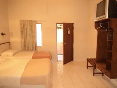 Una televisión o centro de entretenimiento en Hotel Kuraica