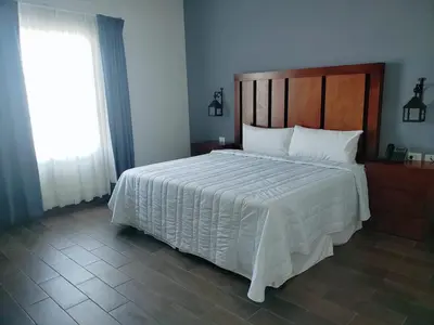 Cama o camas de una habitación en HOTEL PLAZA MATAMOROS