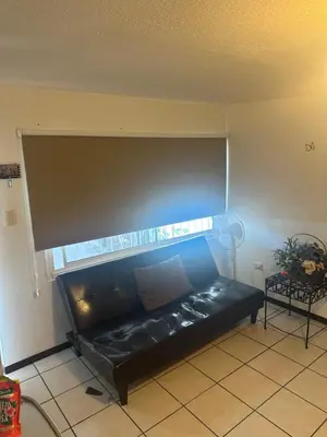 Zona de estar de Departamento privado con cochera y WIFI alta velocidad