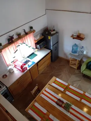 Una cocina o zona de cocina en Hermosa y cálida casa tipo cabaña