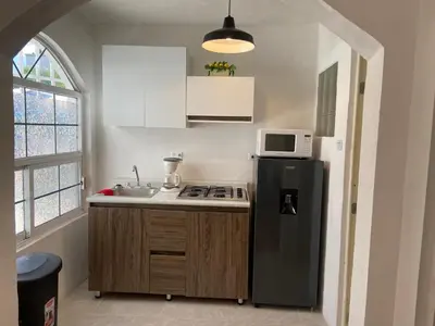 Una cocina o zona de cocina en Bonito apartamento Wifi alta, Minisplit