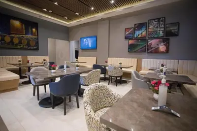 Una televisión o centro de entretenimiento en Hyatt Place Saltillo