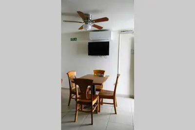 Una televisión o centro de entretenimiento en Rubí Joyas del Mar Bahia de Kino