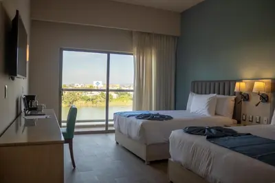 Cama o camas de una habitación en Varali Grand Hotel