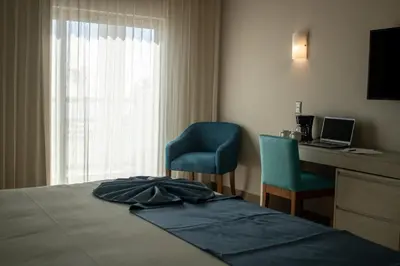 Cama o camas de una habitación en Varali Grand Hotel