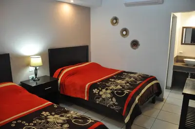 Cama o camas de una habitación en Hotel Los Valles