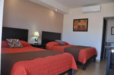 Cama o camas de una habitación en Hotel Los Valles