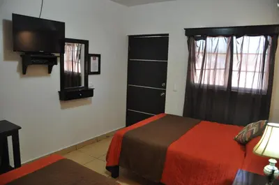 Cama o camas de una habitación en Hotel Los Valles