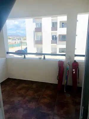Un balcón o terraza de Departamento para familias