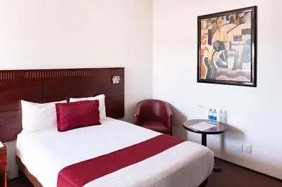 Cama o camas de una habitación en Hotel Casablanca