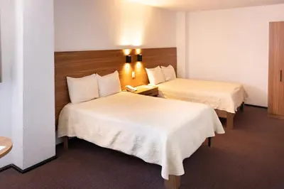Cama o camas de una habitación en Hotel Casablanca