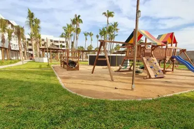 Zona de juegos infantil en DEPARTAMENTO EN PLANTA BAJA CON TERRAZA