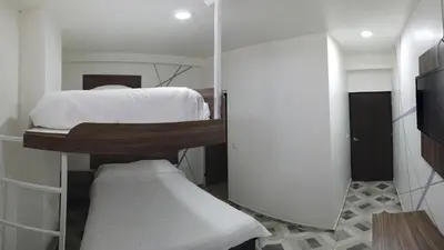 Cama o camas de una habitación en Hotel Town Express