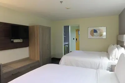 Cama o camas de una habitación en Holiday Inn Express Piedras Negras by IHG