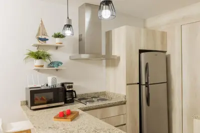 Una cocina o zona de cocina en Departamento NUEVO equipado completo!!