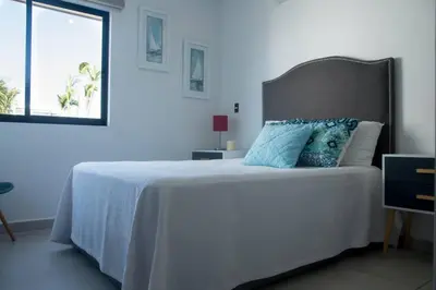 Cama o camas de una habitación en Departamento familiar en Mazatlán
