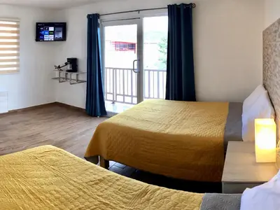Cama o camas de una habitación en HOTEL COLIBRÍ