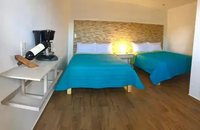 Cama o camas de una habitación en HOTEL COLIBRÍ