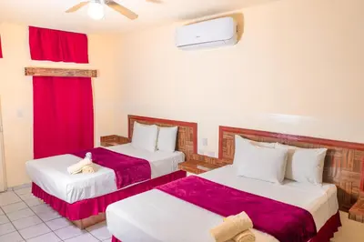 Cama o camas de una habitación en Hotel Buenos Aires
