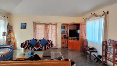Una televisión o centro de entretenimiento en Casa Grande - Coco Cabanas Loreto