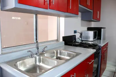 Una cocina o zona de cocina en Departamentos Cumbres de Creel