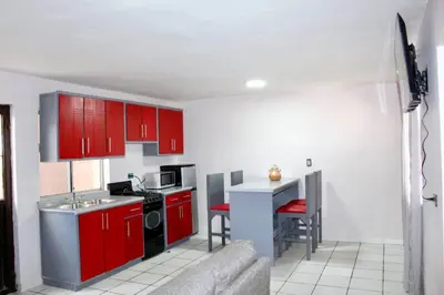 Una cocina o zona de cocina en Departamentos Cumbres de Creel
