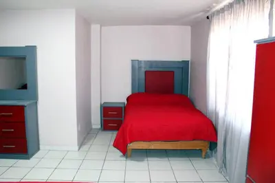 Cama o camas de una habitación en Departamentos Cumbres de Creel