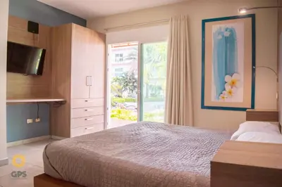 Cama o camas de una habitación en hermoso depa con vista a la marina by G P S rentas