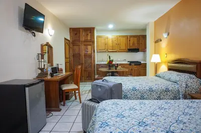 Cama o camas de una habitación en Hotel Las Fuentes
