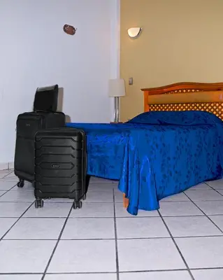 Cama o camas de una habitación en Hotel Las Fuentes