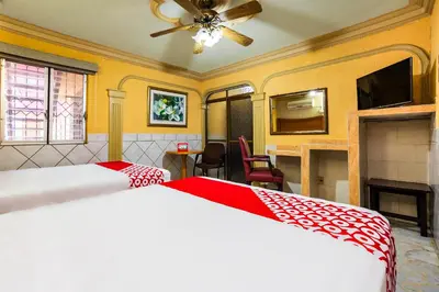 Cama o camas de una habitación en Hotel San Marcos