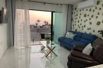 Zona de estar de Departamento con vista al mar