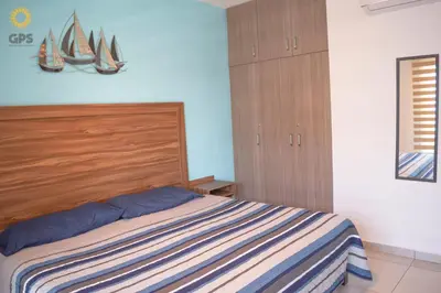 Cama o camas de una habitación en Depa en la marina a 5min de la playa by G P S rentas